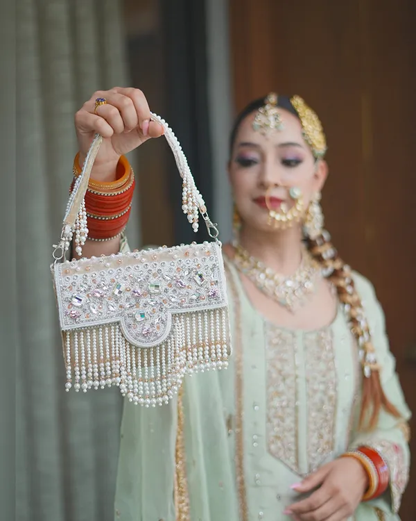 Pearl_Grace_Embellished_Tassel_Clutch